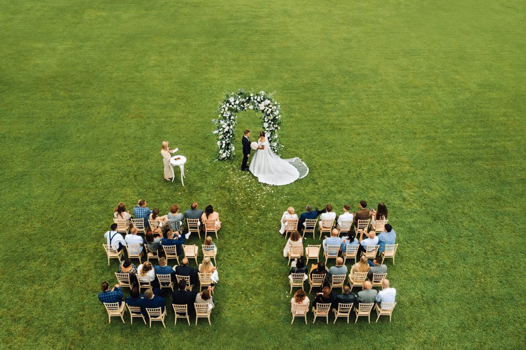 Drone video top view of the wedding ceremony in a green field